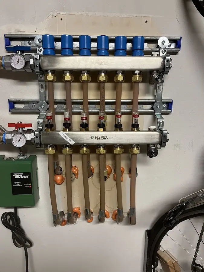 Plumber performing Leak Detection at a residential property in Brookville